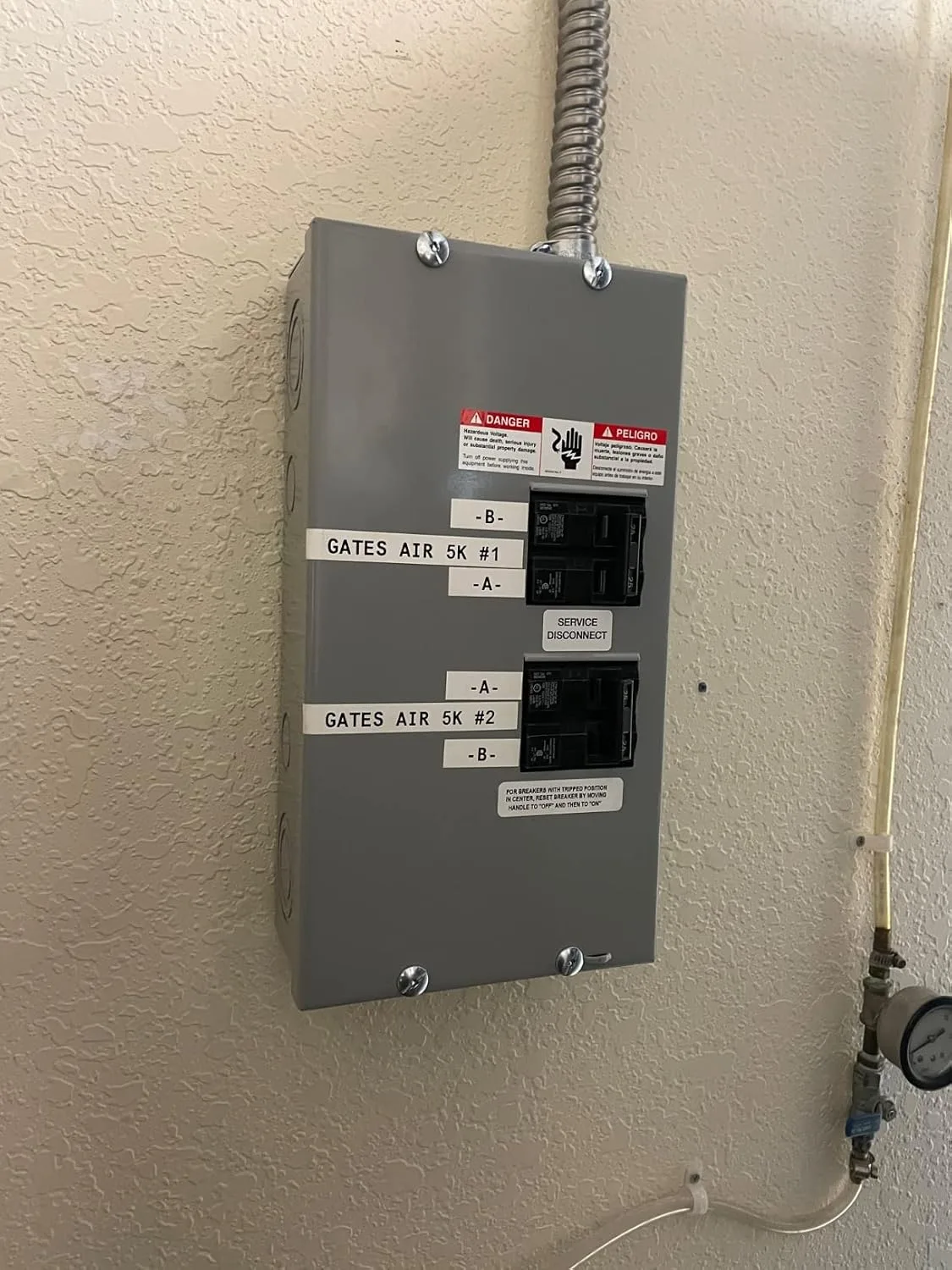 Customer photo of deteriorated electrical panel showing corrosion and wear