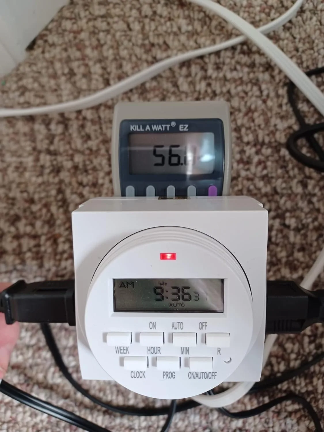 Customer photo of power meter displaying wattage readings from household appliances