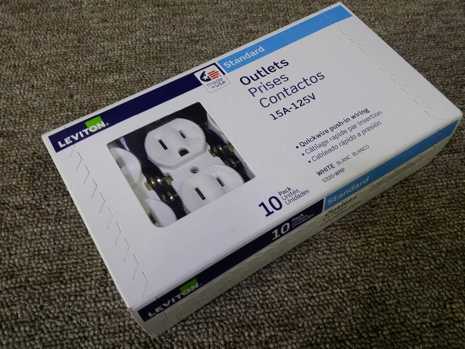 Customer photo of backstab outlet terminals showing wire insertion points and connection method