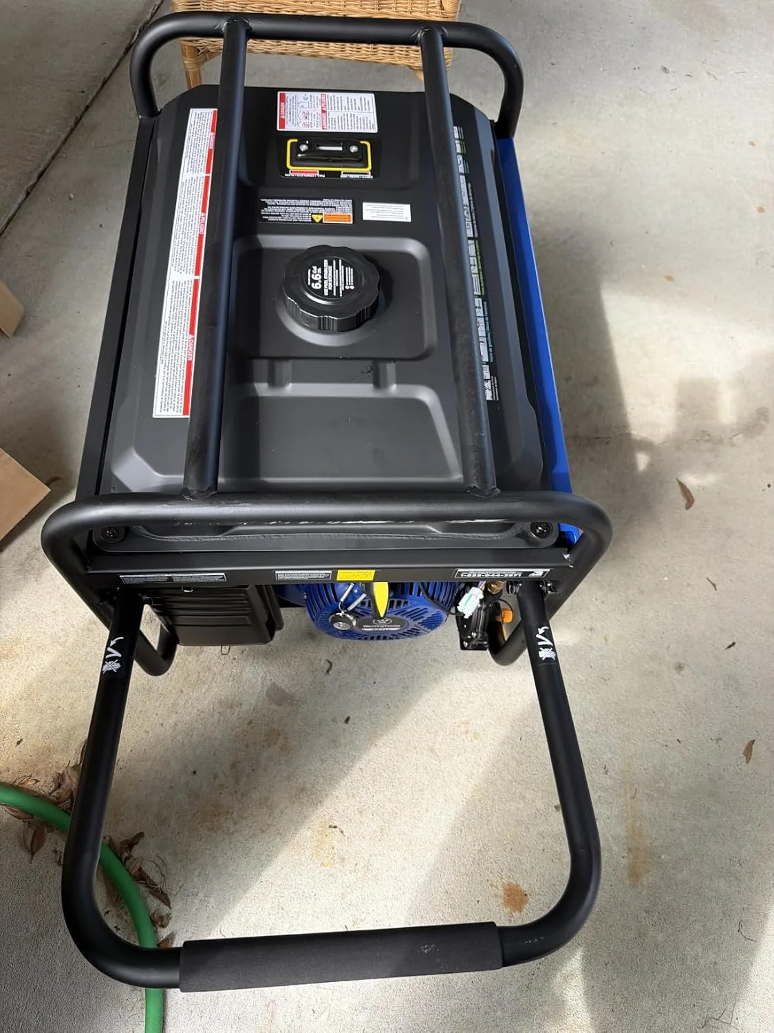 Customer photo of generator specifications and wattage nameplate details
