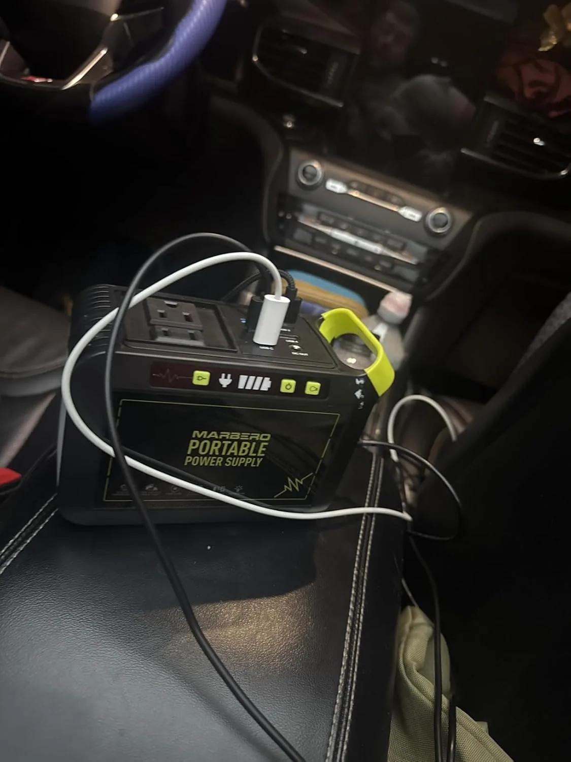 Customer photo of battery system display screen showing power output and usage metrics during week-long home test
