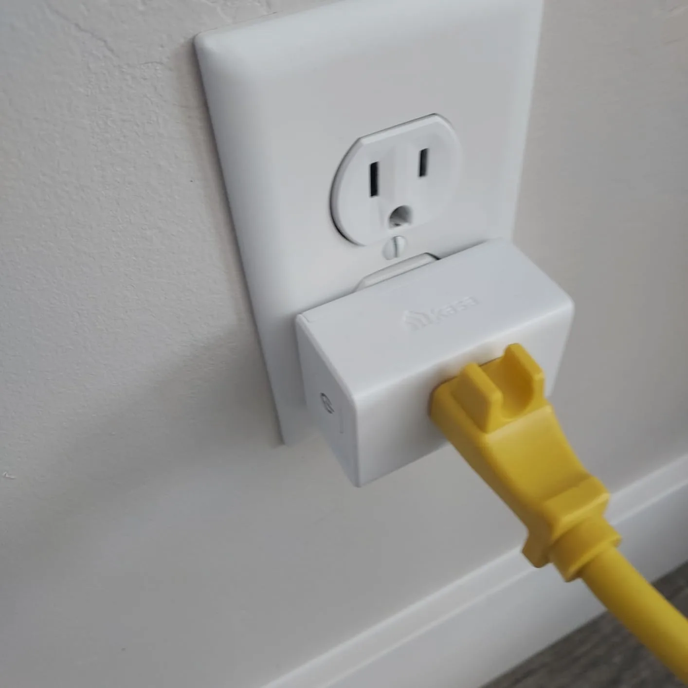 Customer photo of smart switch installed in wall outlet showing integration setup