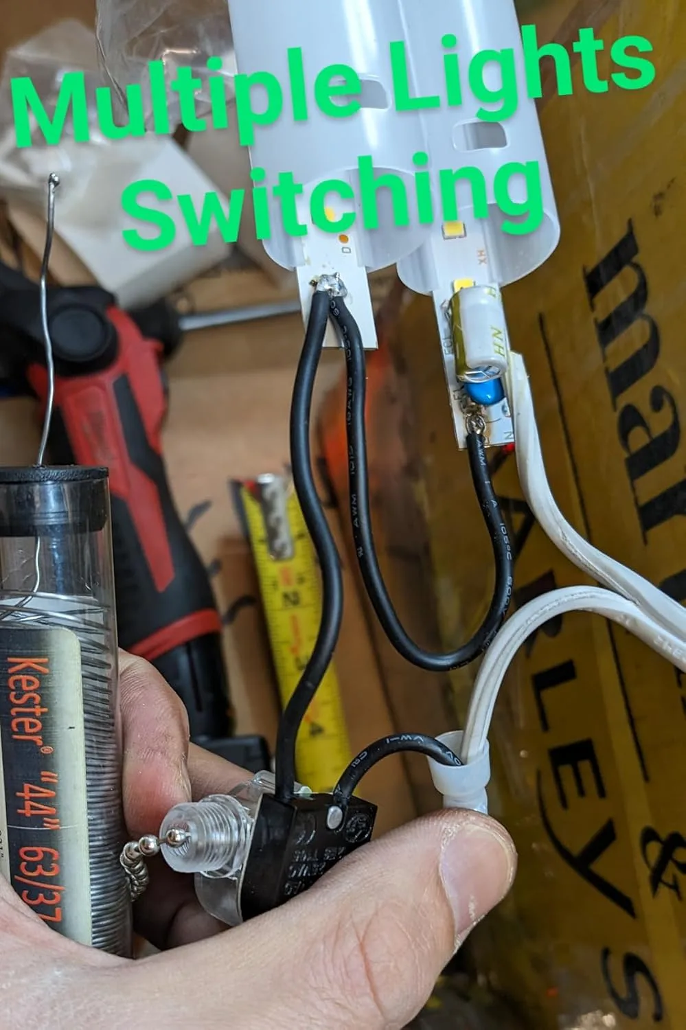Customer photo of LED shop light installed in garage workspace showing brightness and coverage
