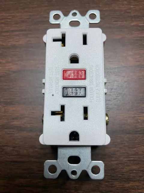 Customer photo of dual function GFCI/AFCI outlet installed in bathroom wall