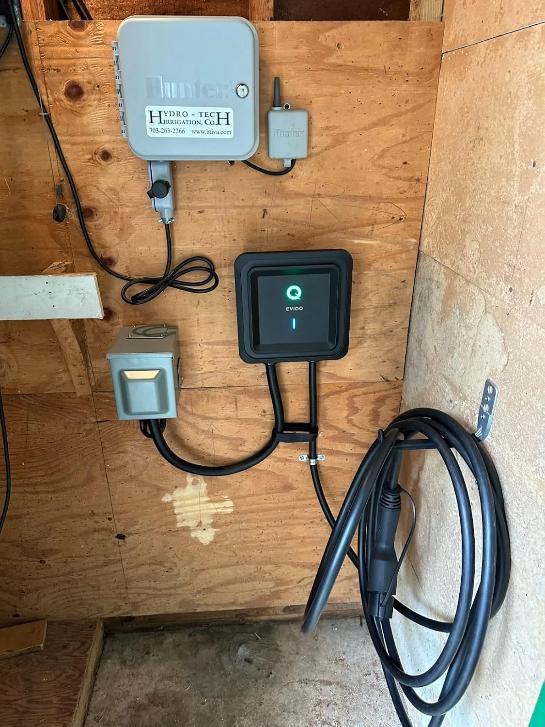 Customer photo showing Level 2 charger installation on residential home garage wall