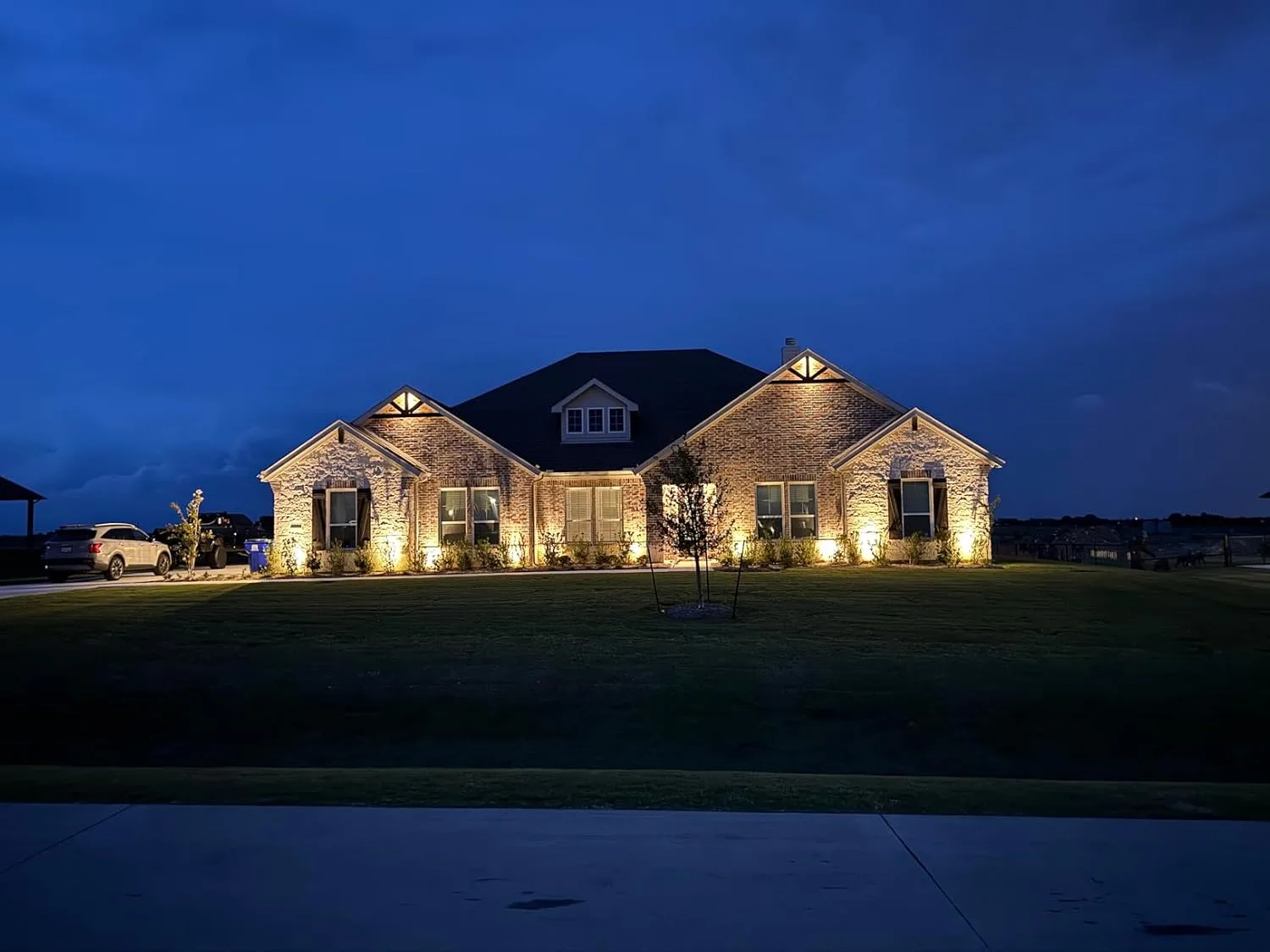 Customer photo of low-voltage landscape lighting transformer and wiring components laid out